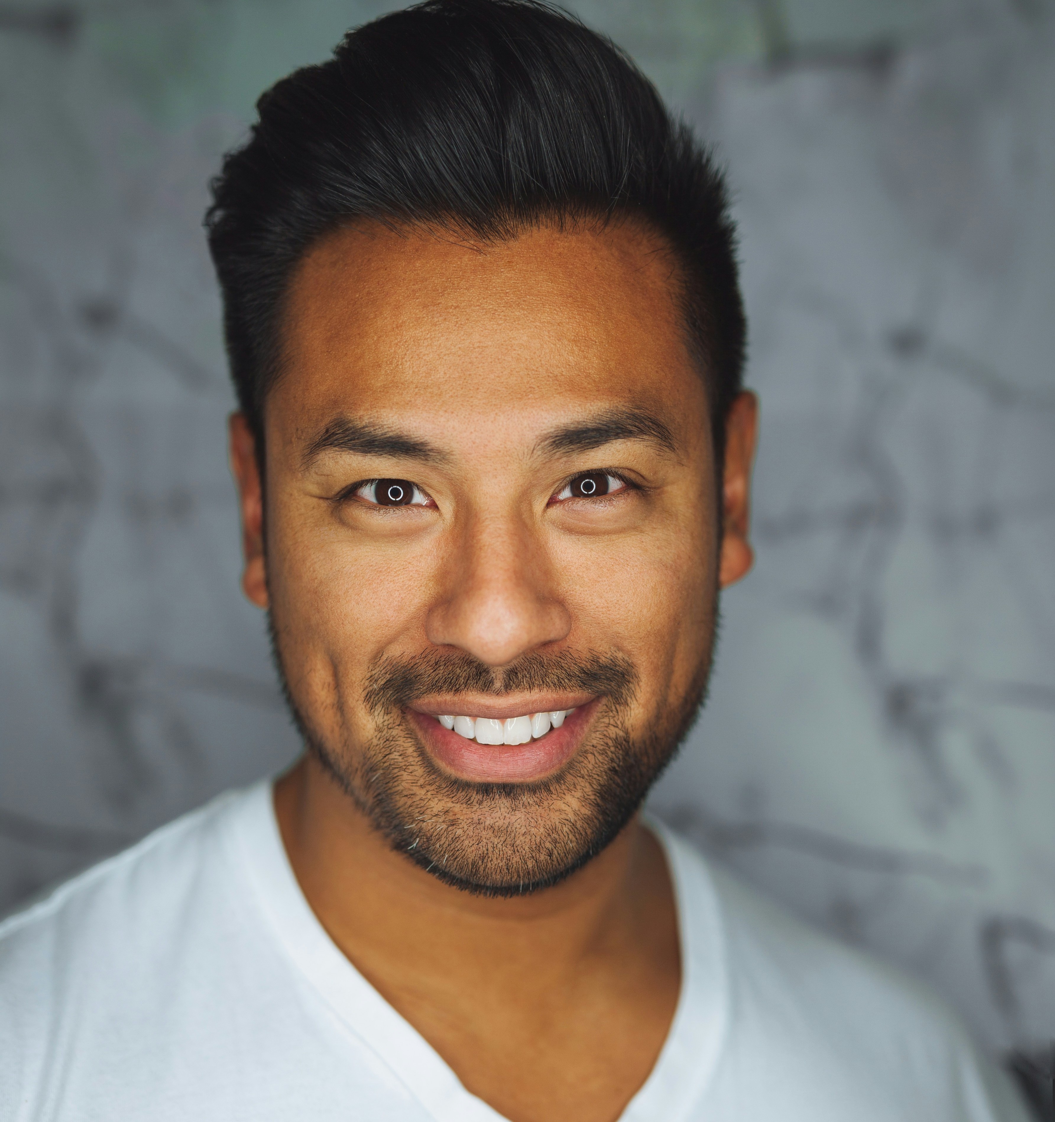 Professional headshot of Alex Chen